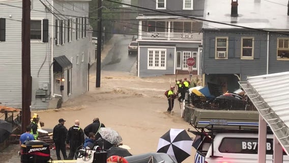 Water on Main Street of downtown Ellicott City