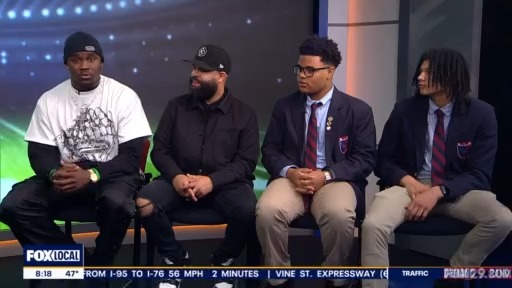 Eagles Jalyx Hunt, barber Kenny Duncan helping Boys' Latin students visit colleges