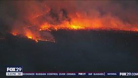 Crews work to extinguish huge Ocean County wildfire as evacuations lifted