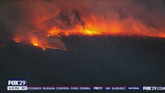 Crews work to extinguish huge Ocean County wildfire as evacuations lifted
