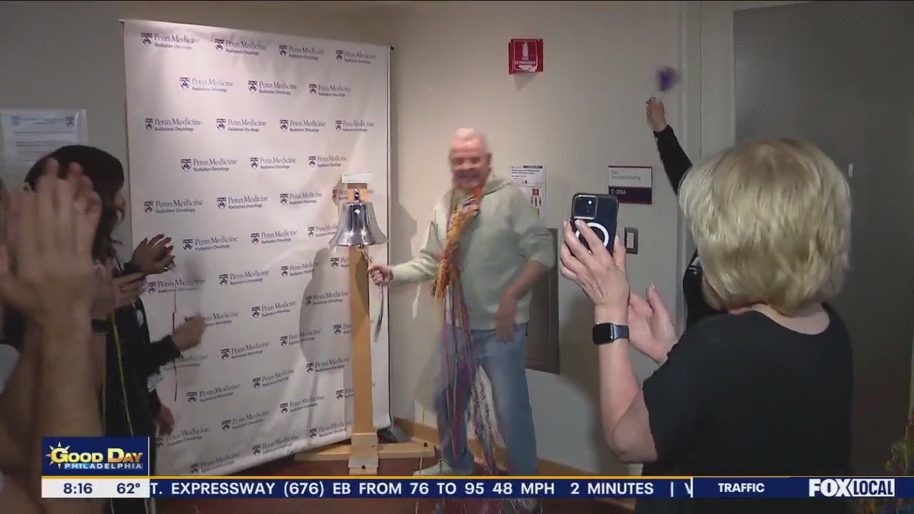 Mike Jerrick rings the bell after completing radiation for prostate cancer