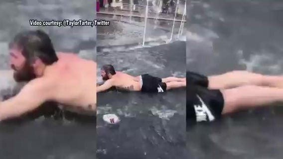 Alex Ovechkin dives into Georgetown Fountain