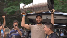 Caps players celebrate in Arlington with Stanley Cup