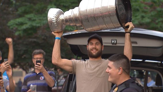 Caps players celebrate in Arlington with Stanley Cup