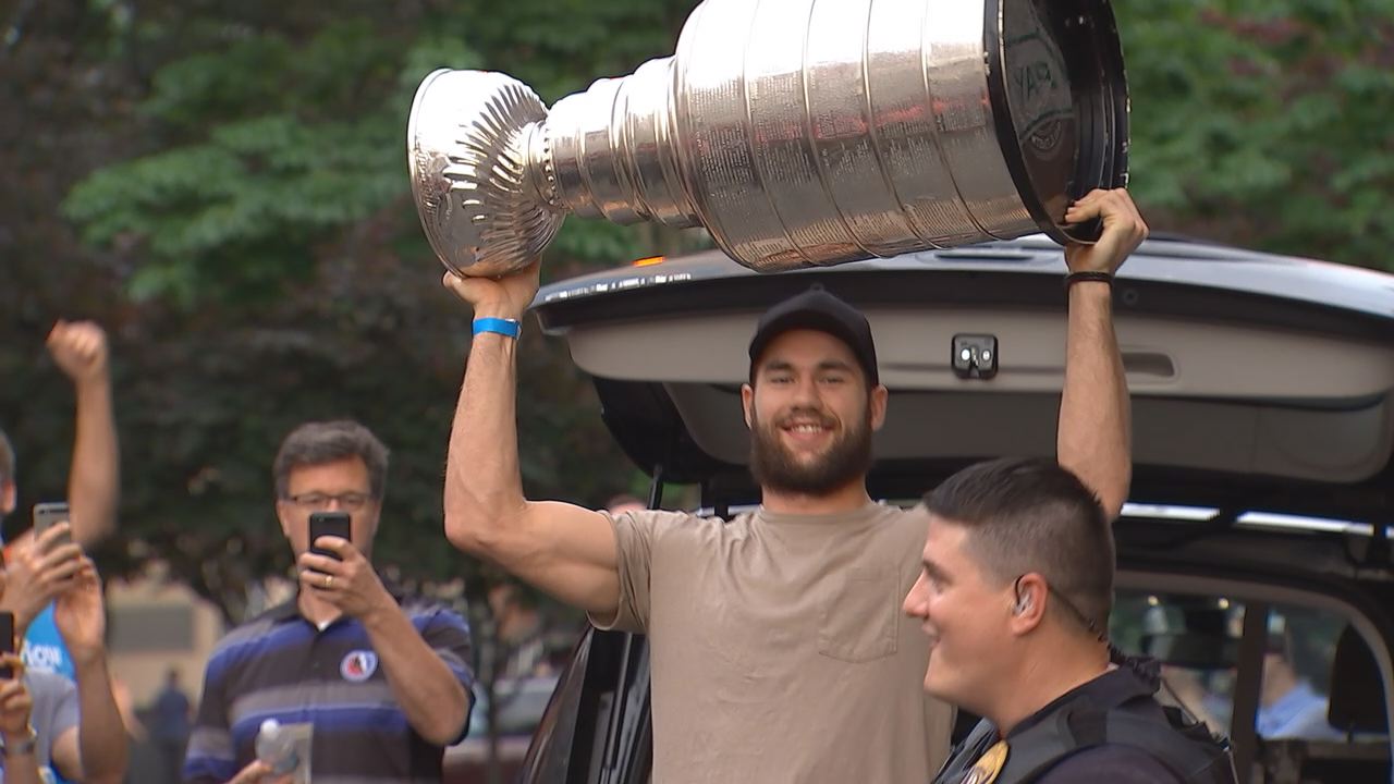 Caps players celebrate in Arlington with Stanley Cup