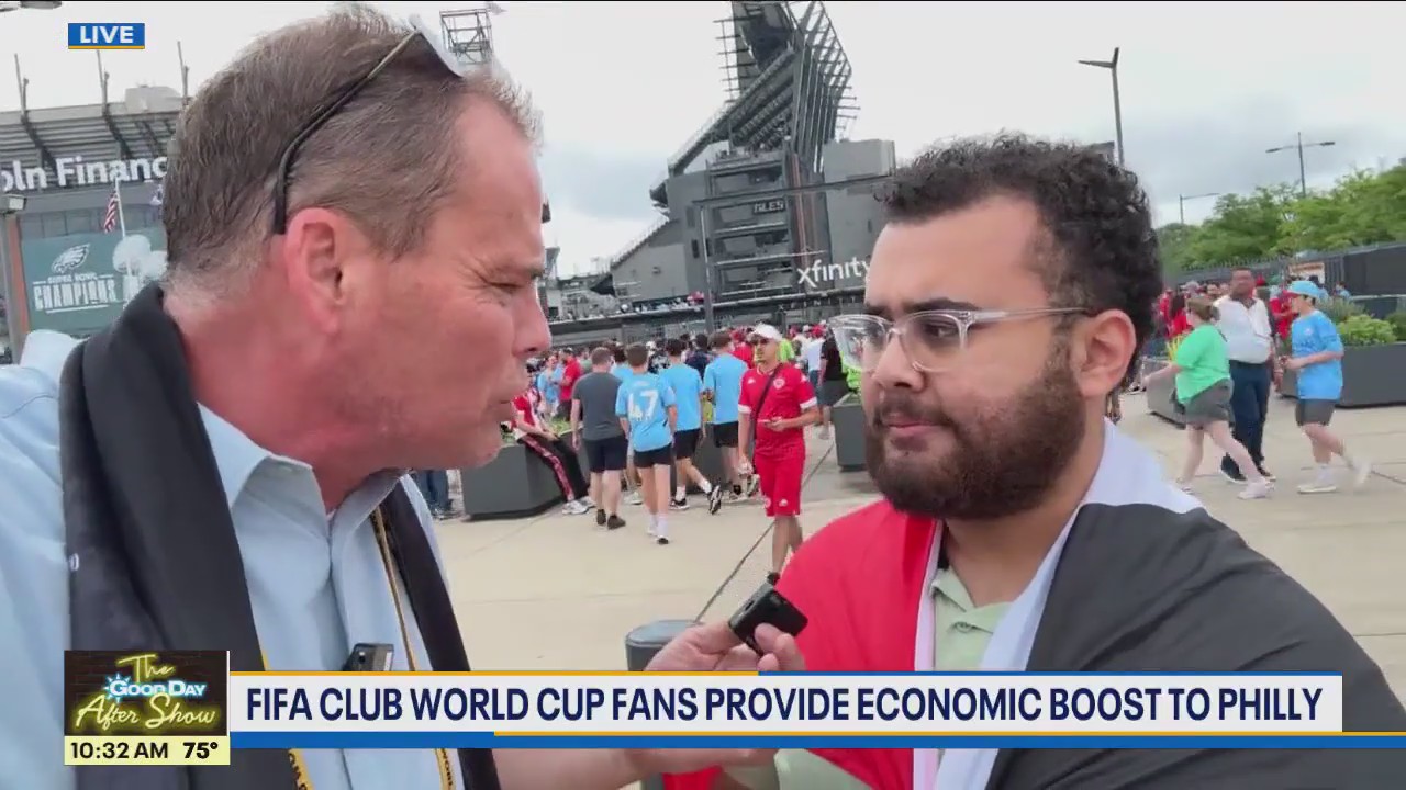 Hank talks to fans outside FIFA Club World Cup