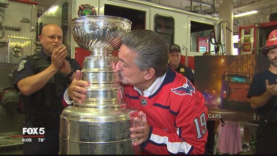 Washington Capitals owner Ted Leonsis celebrates with Stanley Cup for first time
