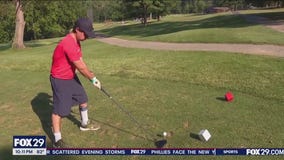 Man defies health odds while using golf to cope with heart defects