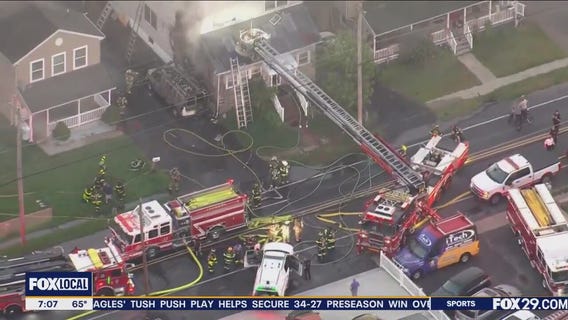 Work van set on fire, flames spread to Croydon home, officials say