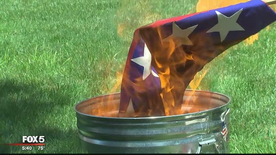 Activist burns Confederate-Nazi flag outside Leesburg courthouse