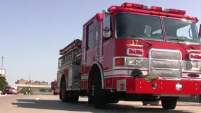 Firefighter surprises deputy with marriage proposal