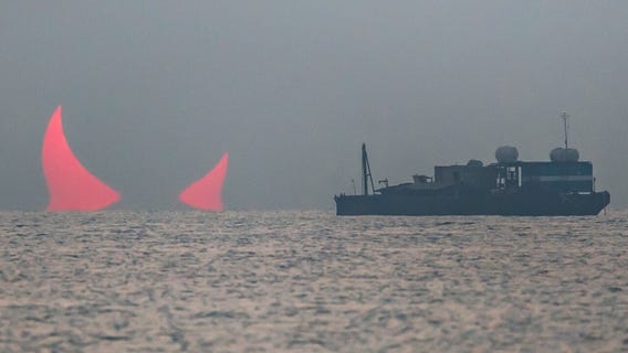 Photo of sun eclipsed by moon bears uncanny resemblance to 'devil horns'