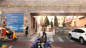 China says it can't rule out that new virus could spread between humans