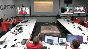 NASA team cheers as helicopter makes 1st powered flight on another planet