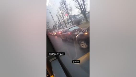 Cars line up at gas station in Ukraine as Russia launches military operation