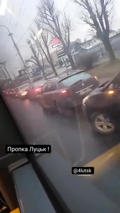 Cars line up at gas station in Ukraine as Russia launches military operation