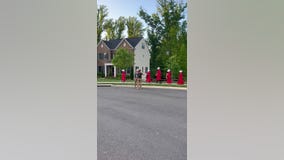 Pro-choice protesters march near Justice Barrett's home dressed in 'Handmaid's Tale' costumes