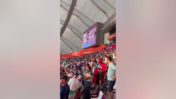 Inside World Cup stadium during Iran national anthem