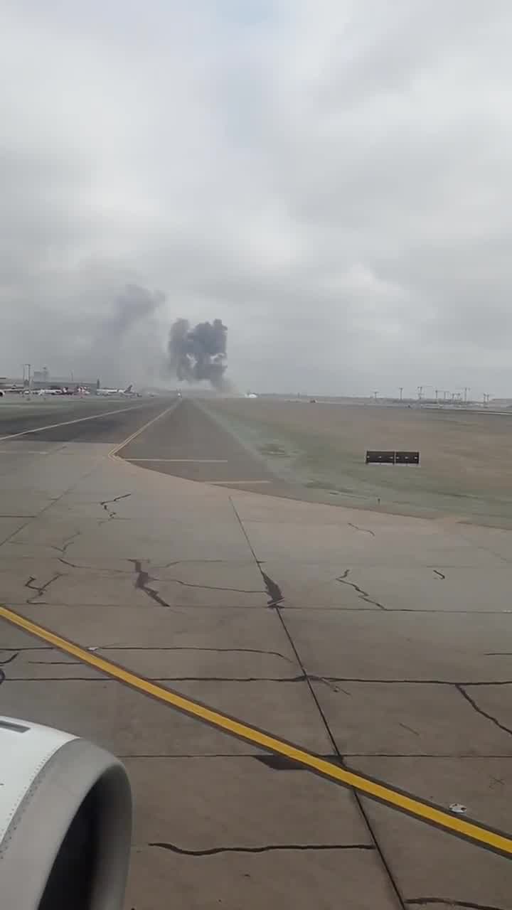 Smoke plumes rise from wreckage after deadly plane crash in Lima