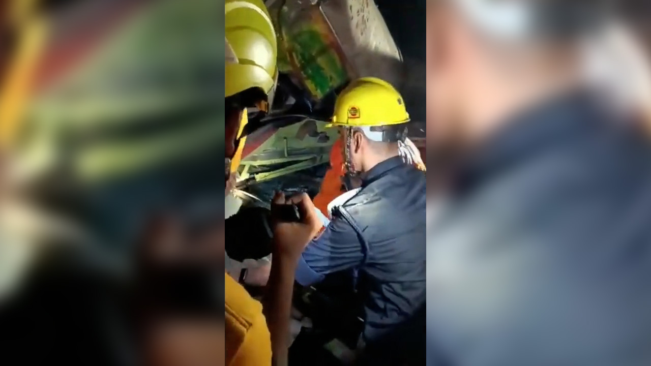 Rescuers work to free trapped victims after train derailment in India