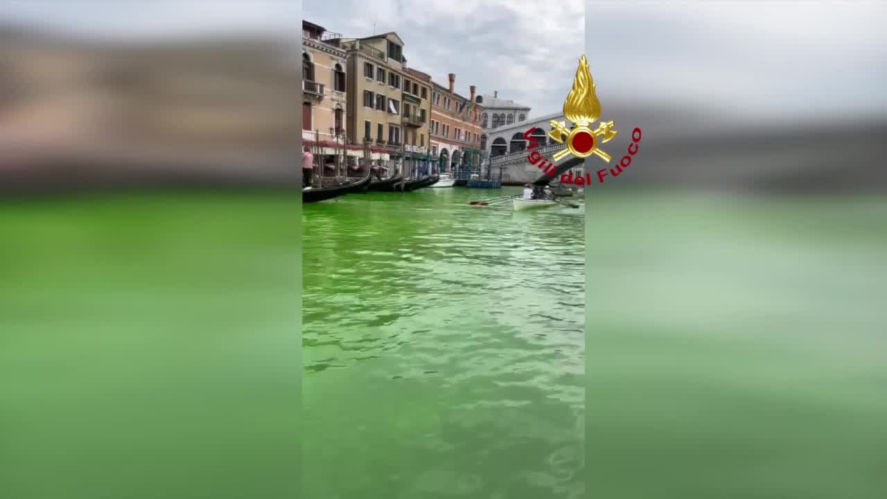 Venice's famous Grand Canal turns fluorescent green