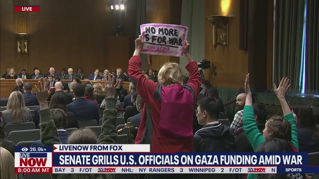 Protestors interrupt hearing on war funding