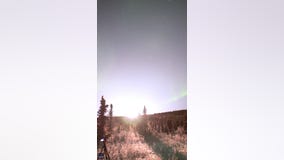 Rocket launches amid beautiful Alaskan aurora