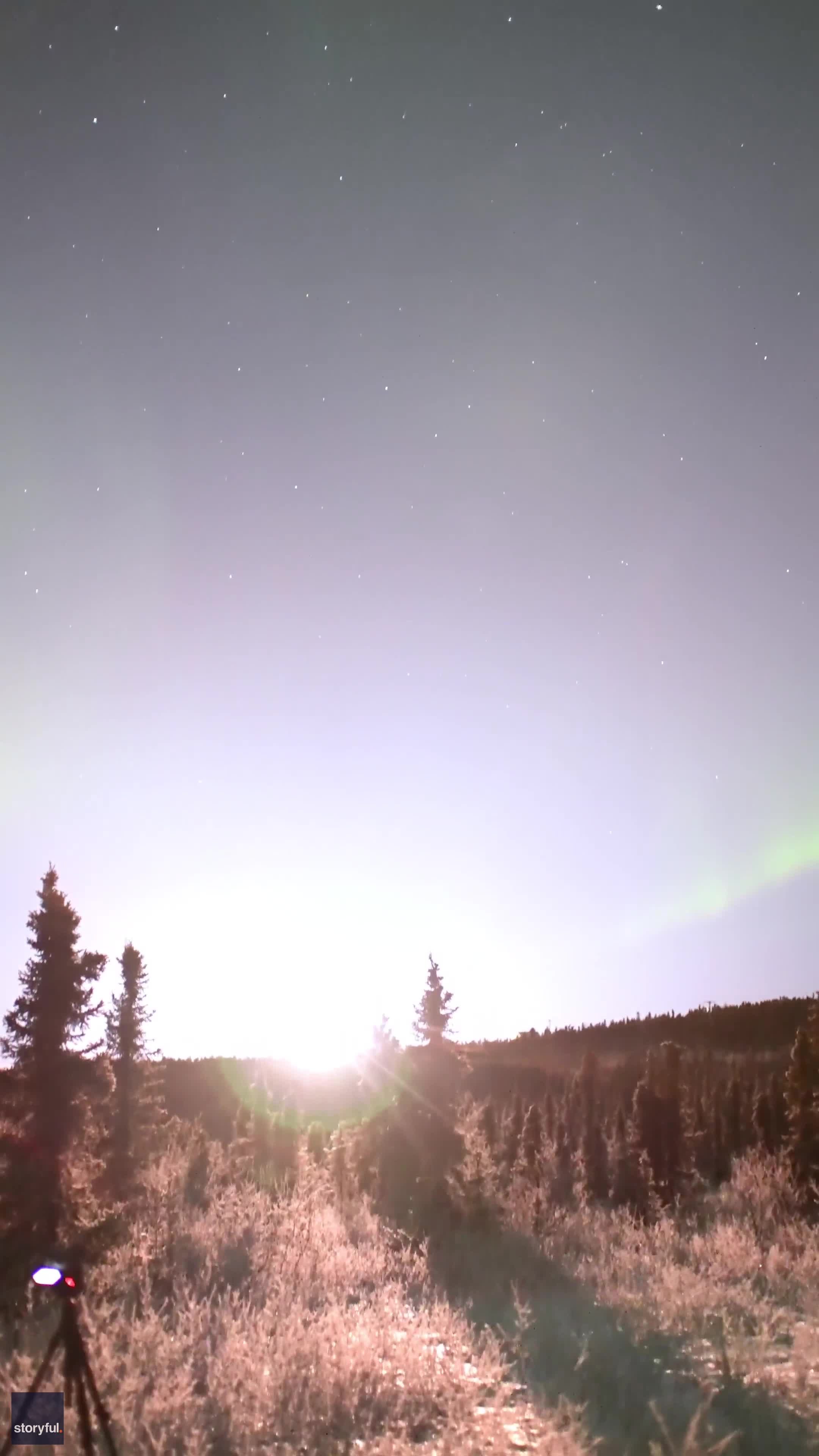 Rocket launches amid beautiful Alaskan aurora