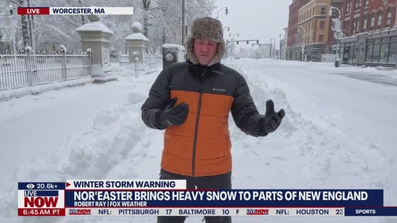 Heavy snow pours into Massachusetts