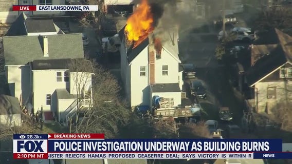 Police investigation underway as building burns