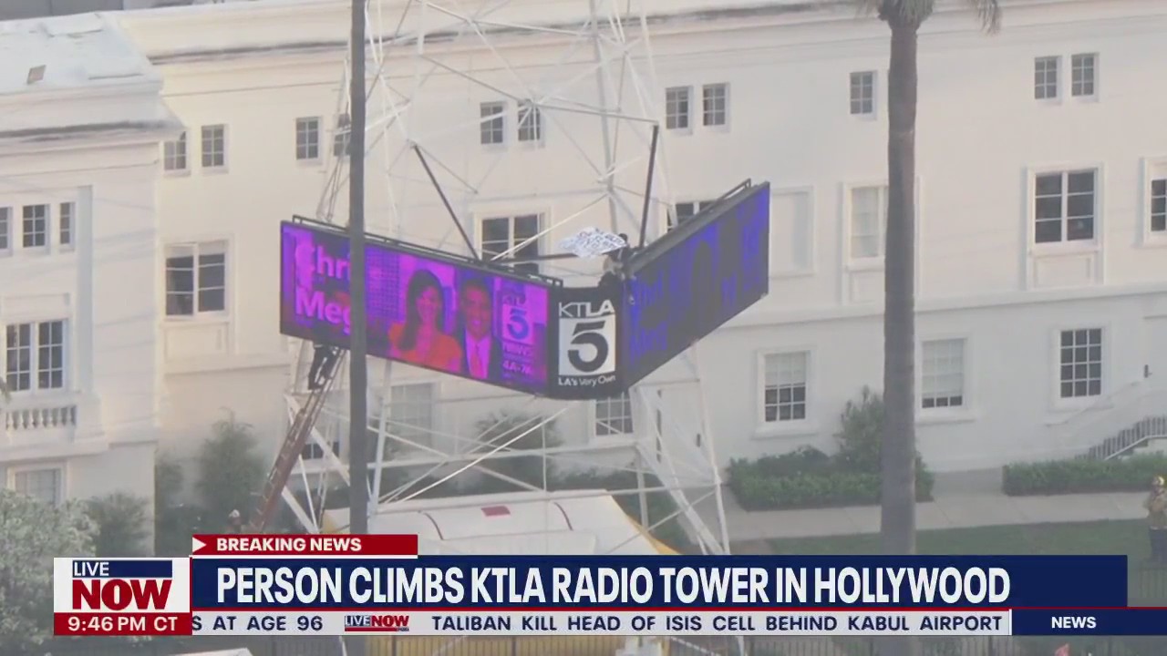 Man climbs KTLA tower in Hollywood holding a 'Free Billie Eilish' sign | LiveNOW from FOX
