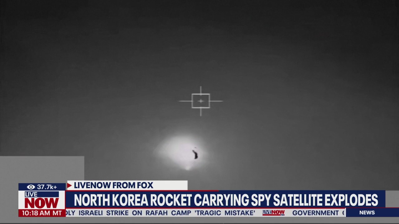 North Korea rocket carrying spy satellite explodes