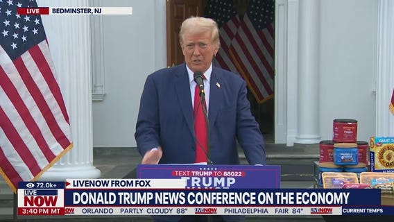 Donald Trump takes questions from reporters