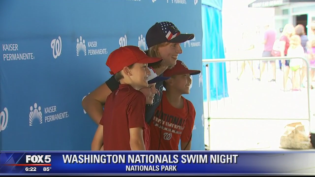 Katie Ledecky greets Nationals fans for Swim Night at Nationals Park
