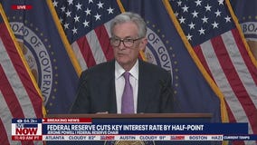 Federal Reserve cuts key interest rates by half-point