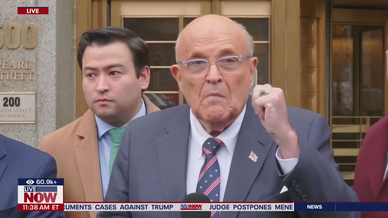 Rudy Giuliani speaks outside of court