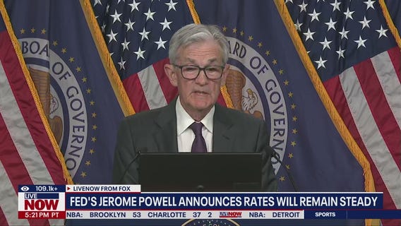 Fed defies Trump, holds interest rates steady