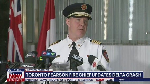 Reporters shout questions at Toronto officials