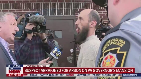 Cody Balmer arrives at court, sticks tongue out