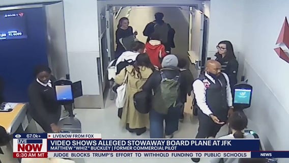 Newly released video shows alleged stowaway at JFK