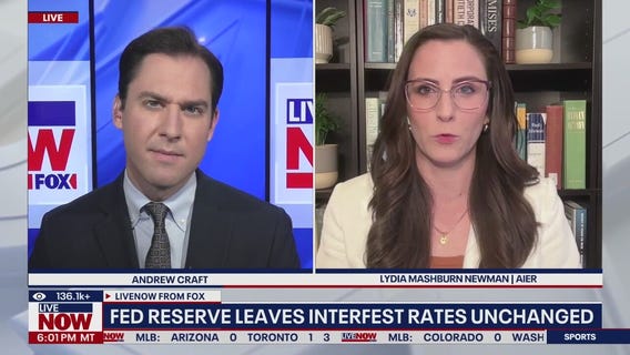 Fed holds rates steady for a fourth straight meeting