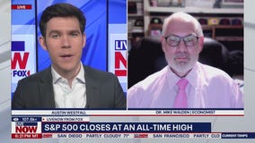 S&P 500 hits new record, Dow jumps over 400 points