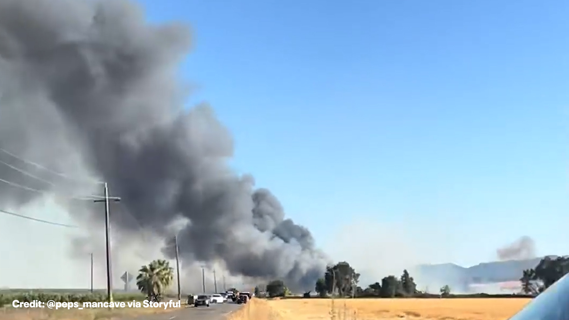 Explosion at fireworks warehouse sends smoke plume into sky
