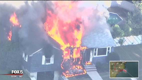 Suspected gas explosions damage homes near Boston