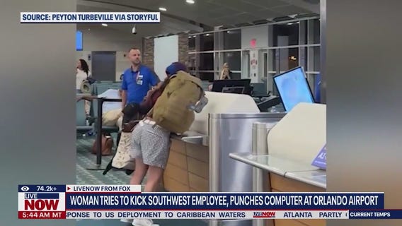 Woman tries to kick airport staff, punches monitors