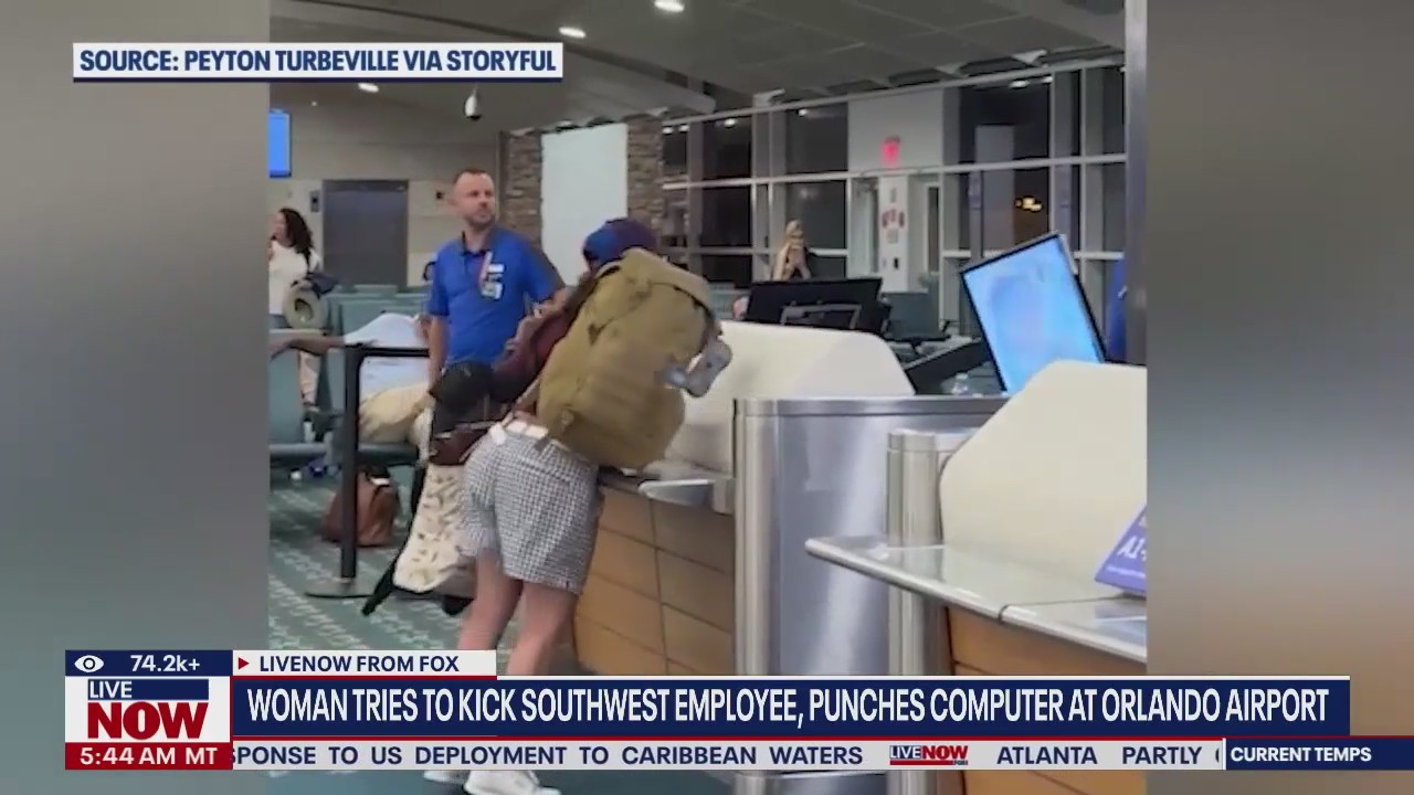 Woman tries to kick airport staff, punches monitors