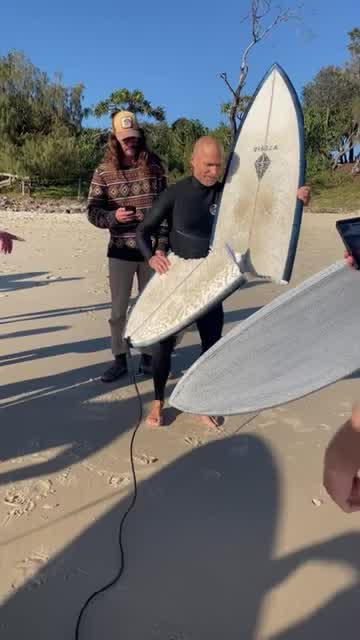 Surfer escapes after shark bites massive chunk from board