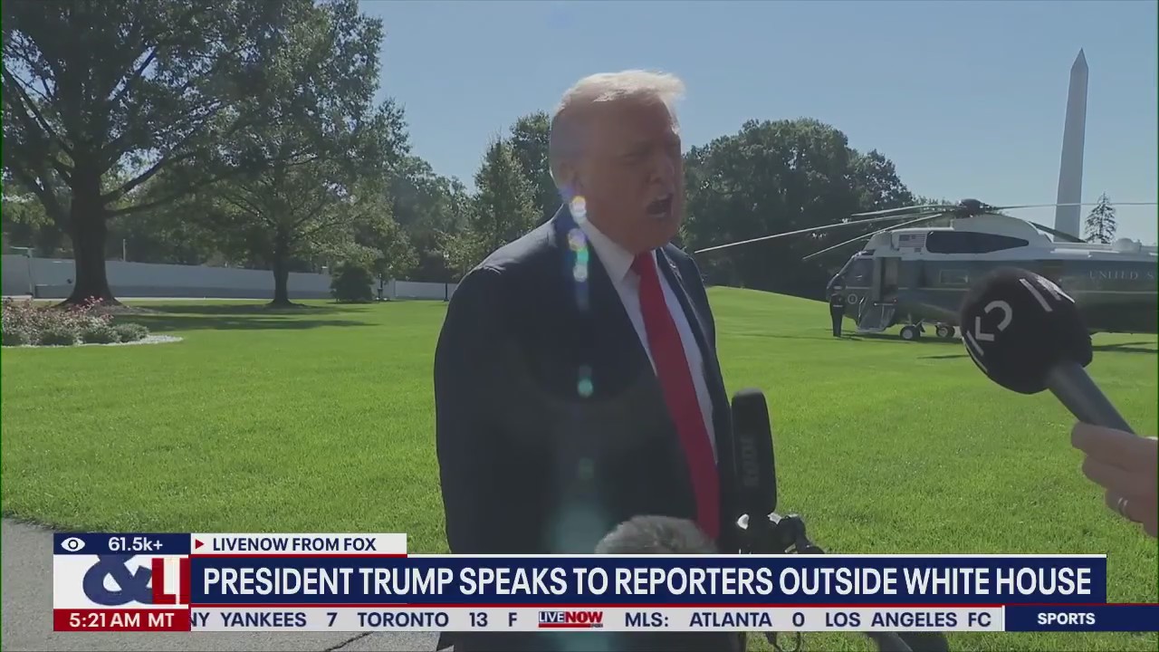 Trump speaks to reporters outside White House
