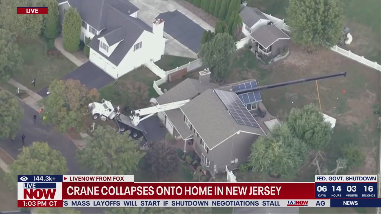 Crane collapses onto home in New Jersey