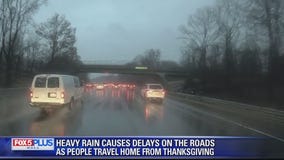 Cold and wet weather hampers holiday travel, shopping